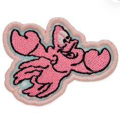 a pink patch with an image of a bird on it's back and wings