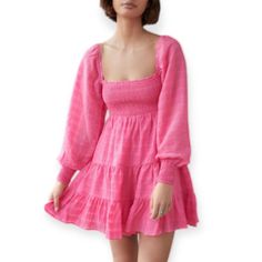 Size S Urban Outfitters | River Smock Long Sleeve Mini Dress Barbie Pink Airy Textured Mini Dress From Uo With A Square Neckline And Smocked Bodice. Tiered Through The Mini Skirt And Finished With Puff Sleeves. - 100% Polyester - Machine Wash Summer Mini Dress With Elastic Sleeves For Brunch, Spring Pink Smocked Dress With Elastic Sleeves, Spring Vacation Smocked Dress With Puff Sleeves, Pink Smocked Dress With Elastic Sleeves For Spring, Spring Mini Dress With Elastic Sleeves For Day Out, Long Sleeve Smocked Dress For Vacation, Pink Dress With Elastic Sleeves For Day Out, Square Neck Dresses With Smocked Cuffs For Day Out, Pink Dresses With Elastic Sleeves For Day Out