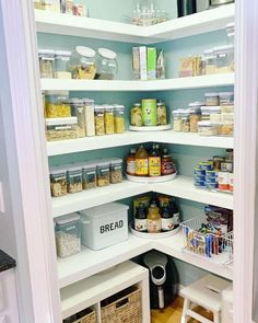 an organized pantry with lots of food in it