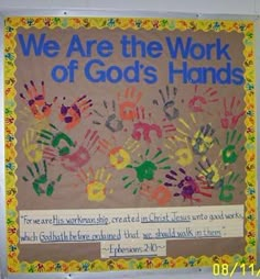 we are the work of god's hands bulletin board with handprints on it