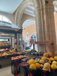 there are many fruits and vegetables on display