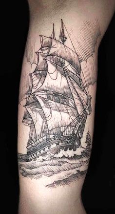 a black and white tattoo with a ship on it