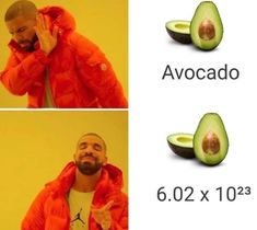 the man is talking on his cell phone next to an avocado cut in half