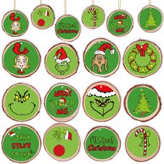 christmas ornaments are hanging on the wall in front of a white background with green and red decorations