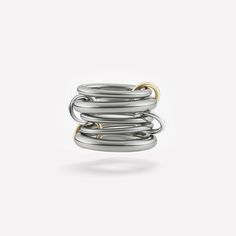 The Vela SG linked ring appeals to our affinity for streamlined structure. Sculptural and kinetic, with unisex appeal, the Vela balances five bands with a cascade of multi-tonal connectors. The Vela SG is commonly worn spread over several fingers, but can also be styled as a stacking design, allowing its orbit of multi-gauged bands to unite as a structural whole. The Vela SG is individually handmade in Los Angeles. Bands: .925 sterling silver 2.3mm gauge .925 sterling silver band 3.8mm gauge .92 Modern Stacked Jewelry, Modern White Gold Stackable Metal Rings, Linked Rings, Linking Rings, Ring Sizer, Sterling Silver Bands, Photo Jewelry, Silver Band, My Jewellery