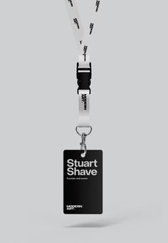 a black and white lanyard with the words stuart shave on it's tag