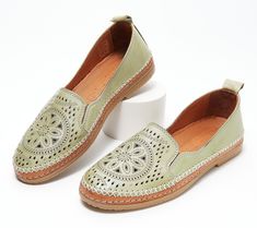 These leather slip-ons boast an intricately designed, perforated upper that demands attention. Whether you choose to wear them with your go-to jeans, a cute maxi dress, or shorts during those warm summer months, they're destined to radiate your sense of style for all to enjoy. From Spring Step. Comfortable Leather Slip-ons For Spring, Leather Slip-ons With Woven Sole For Spring, Spring Flat Heel Slip-ons With Perforations, Summer Leather Slip-ons With Perforations, Leather Slip-ons With Perforations For Summer, Spring Slip-ons With Perforations And Flat Heel, Spring Perforated Flat Heel Slip-ons, Spring Green Slip-ons With Rubber Sole, Green Slip-ons With Textured Sole For Spring