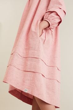 The Syli dress and blouse are relaxed everyday garments with a loose fit. Both variations feature a gathered bodice, a shallow tuck across the chest and a hemline that dips slightly longer in back. The neckline is finished with binding with a back vent secured by ties. The calf-length dress has two deep tucks around th Dress And Blouse, Gathered Bodice, Dress Weights, Calf Length Dress, Dress Blouse, Blouse Pattern Sewing, Clothes Sewing Patterns, Draped Fabric, Blouse Pattern