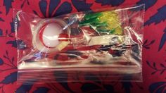 the package is packed with candy canes and other candies, including one lollipop