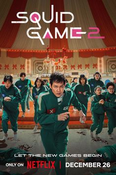 the movie poster for squid game 2 is shown in front of a group of people