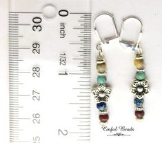 Dainty Multicolor Picasso Seed Bead Stick Earrings With Flower Spacer Bead Lightweight and Comfortable Boho Statement Jewelry - Etsy Multicolor Nickel-free Flower Earrings, Nickel-free Multicolor Flower Earrings, Nickel Free Multicolor Dangle Flower Earrings, Multicolor Nickel-free Dangle Flower Earrings, Adjustable Nickel-free Flower Beaded Earrings, Nickel-free Multicolor Dangle Flower Earrings, Multicolor Bohemian Nickel-free Flower Earrings, Adjustable Multicolor Flower Earrings With Colorful Beads, Stick Earrings