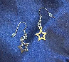 These Open Star Earrings are made to wear every day as they are extremely lightweight. These earrings are handmade by me and the backings to the earrings are nickel-free and made with brass. Please DM me if you have any questions or are interested in buying. Happy shopping! Note: If you want a tracking number on your package, shipping will cost extra. Nickel-free Metal Star Earrings, Nickel-free Star Shaped Metal Earrings, Nickel-free Star-shaped Metal Earrings, Nickel-free Star-shaped Earrings For Jewelry Making, Star Shaped Nickel Free Plug Earrings For Gift, Star-shaped Nickel-free Plug Earrings As Gift, Nickel-free Star Shaped Plug Earrings For Gift, Star-shaped Nickel-free Plug Earrings For Gift, Hypoallergenic Star-shaped Metal Earrings