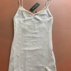 The Cutest White Bodycon Dress With Daisy Pattern Mesh Overlay. Perfect For Summer And So Sexy. Bought On The Motel Website Mesh Daisy Dress, Daisy Lace Dress, Motel Rocks Satin Dress, Daisy Tv Dress, Coti Dress, Motel Rocks Dress, Tye Dye Dress, Visual Archive, Low Back Dresses