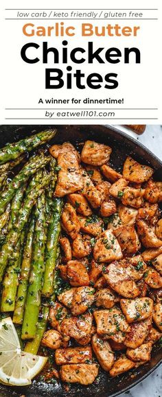 grilled chicken and asparagus in a skillet with lemon wedges on the side