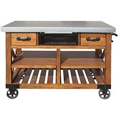 a kitchen island with two drawers and an oven on the top, sitting on casteors