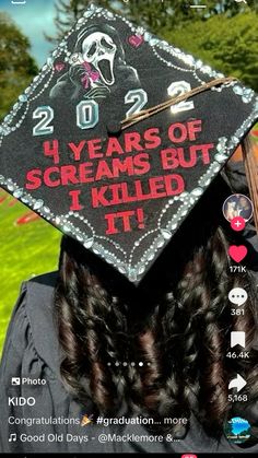 a person wearing a graduation cap with the words 20 years of screams but i killed it