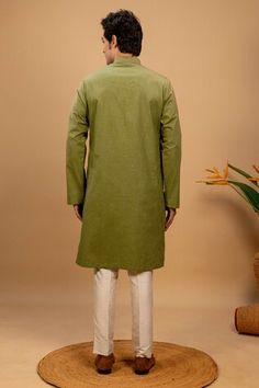 Green kurta with quilted embroidery on left and right side. Paired with a cotton silk churidar. - Aza Fashions Fitted Cotton Kurta With Traditional Drape, Cotton Sherwani With Chikankari Embroidery In Traditional Fit, Fitted Cotton Sherwani With Straight Kurta, Festive Cotton Sherwani With Traditional Fit, Fitted Cotton Sherwani With Traditional Drape, Cotton Kurta With Pallu For Transitional Season, Cotton Kurta With Pallu In Traditional Drape, Traditional Fit Cotton Sherwani With Cutdana, Cotton Sherwani With Cutdana In Traditional Fit