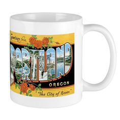 a white coffee mug with the word portland on it and an orange flowered border