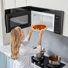 Our sleek and versatile Over-the-Range Microwave is perfectly designed for your modern kitchen. With a 1.7 cu. ft. Capacity, this microwave makes it easy to heat large plates and platters. Its Sensor Cooking Technology detects your food’s moisture levels and automatically adjusts the cooking time to prevent cold spots. You can also connect your microwave to the SmartHome app to utilize voice commands, adjust settings, and monitor cooking progress from your phone. All these great features and mor Smarthome App, Over The Range Microwave, Black Microwave, College Essentials, Range Microwave, Cold Prevention, Soften Cream Cheese, Microwave Recipes, Food Covers