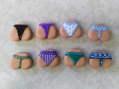 there are six different types of bikinis on the table together, and one is made out of plastic