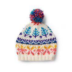 a multicolored knitted hat with pom - pom