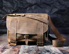 "Express Shipping to the USA, UPS Courier for free Delivery 3-5 Business Days Messenger Bag, Leather Crossbody Bag, Satchel Bag May I present... High quality leather, handmade bag in Brown. All my products are made with great care and attention to every detail. The bag will be a perfect addition to any outfit whether casual, smart or sporty. It is up to you which style you choose, you will be the one to name it. crossbody bag. Sewn in a small workshop in Poland, made of polish leathers, the proj Leather Satchel With Mobile Phone Bag For School, Daily Use Satchel Camera Bag, Crossbody Mobile Phone Bag For Everyday Carry, Everyday Carry Mobile Phone Crossbody Bag, Rectangular Shoulder Bag With Adjustable Strap For Everyday, Waxed Finish Everyday Satchel Bag, Everyday Waxed Finish Satchel Bag, Everyday Carry Satchel With Mobile Phone Bag, Everyday Satchel Bag With Top Carry Handle