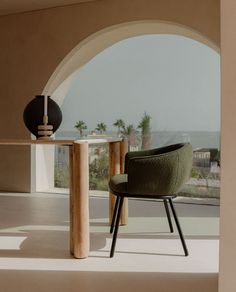 a chair sitting on top of a wooden table