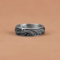 Silver Band Ring with Traditional Ornament Japanese Mythology, Basan Fire Bird Silver Wedding Rings, Japanese Band Ring, Gifts For Husband   Made of 925 silver and handcrafted by hand, this ring is not only an accessory piece that complements your daily elegance, but also has details that will reflect your character and style. It is also a great gift to give to your loved ones on their special days. At SavisSilver, we always give importance to the satisfaction of our customers, we recommend you Dragon Design Ring Jewelry For Gift, Dragon Design Ring Jewelry Gift, Adjustable Dragon Design Jewelry Ring, Adjustable Dragon Design Ring, Dragon Design Anniversary Ring Jewelry, Anniversary Dragon Design Ring, Adjustable Ring With Dragon Design, Silver Dragon Design Jewelry For Anniversary, Sterling Silver Ring With Dragon Design For Gift