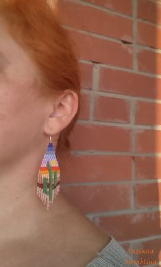 These handmade earrings are made of high-quality Czech beads and strong synthetic thread.In these unique earrings I use my author's scheme . Someone will see on the earrings of sun, sky, cactus, desert, canyon . They are elegant, fashionable, and highly versatile, suitable for everyday wear. Color: yellow,blue,pink,green,braun,beige...(15 colores) Copy without my permission is prohibited For those who want to buy my copyright scheme for these earrings: https://www.etsy.com/uk/listing/963039947/b Multicolor Southwestern Summer Jewelry, Handmade Southwestern Beaded Earrings For Beach, Southwestern Dangle Beaded Earrings For Gifts, Southwestern Dangle Beaded Earrings As Gift, Multicolor Beaded Southwestern Earrings, Multicolor Southwestern Beaded Earrings, Southwestern Colorful Beads Jewelry For Summer, Southwestern Colorful Beaded Summer Jewelry, Southwestern Style Colorful Beaded Summer Jewelry