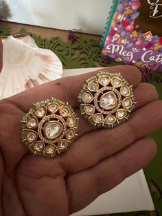 Restocked ♥️ On popular demand  This gorgeous Bridal Studs will add a perfect charm to your festive wear. One of our favorite picks for the wedding season  The diameter of the studs is 3cms. The weight of the studs is 12 grams per pair. Notice the zirconia stones bordering the center Kundan piece. Premium Quality Colour: Mint Green Mirror Work Jhumkas For Diwali Reception, Festive Mirror Work Chandbalis For Reception, Mirror Work Chandbalis For Reception And Festivals, Festival Chandbalis With Mirror Work For Receptions, Chandbalis With Mirror Work For Reception And Festivals, Festive Chandbalis With Gota Work For Reception, Festive Gota Work Chandbalis For Reception, Bridal Earrings With Zari Work For Diwali Reception, Mirror Work Jhumkas For Reception Festivals