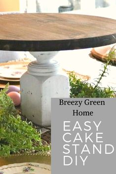 an easy cake stand made out of wood and white paint with text overlay that reads, breezy green home