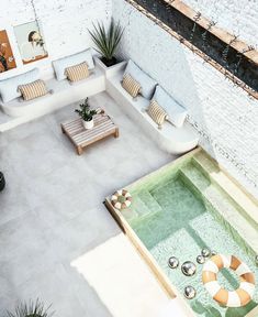 an aerial view of a living room and pool