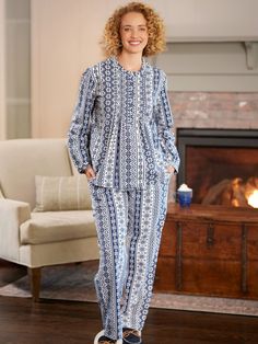 These lightweight flannel pajamas are so festive, you might even call them Christmas pajamas - but you'll want to wear them all winter long! The breathable cotton flannel is soft and cozy and brushed inside and out for added loft and comfort. These fun snowflake pajamas include a pullover top with a Henley-style button placket and button cuffs - both with dyed-to-match buttons. The pajama top is also styled with a yoke in the back and inverted pleats for ease of movement. The matching pajama pan Nordic Snowflake Pattern, Nordic Snowflake, Long Pajama Pants, Flannel Nightgown, Matching Pajama, Vermont Country Store, Flannel Pajama Sets, Flannel Pajamas, Country Store