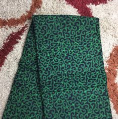 This green and black macaroni African Fabric is high quality African print made from cotton and it's 45 inches wide. It is used for making African Clothing, African quilts, & For Home decoration. FYI: Print is Double sided. The listing is for 1, 6 yards and Headwrap Each piece of fabric measures: 36in by 45in for 1 yard 216in by 45in for 6 yards 72in by 22in for Head wrap If you purchase more than one yard, you will receive one continuous piece. *If you require more than what I have listed, Black Ankara Fabric With Traditional Patterns, Green Kente Cloth, Black Ankara Fabric With Batik Print, Green Ankara Fabric, African Kimono, Green Ankara Fabric With Colorful Pattern, Green Printed Ankara Fabric, Black Ankara Fabric With Colorful Pattern, Colorful Green Ankara Fabric