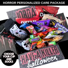 a box filled with halloween candy and candies next to a sign that says horror personalized care package