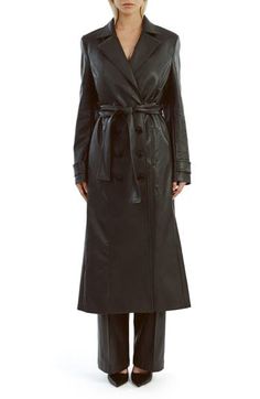 Update your outerwear portfolio with this sleek faux-leather trench coat featuring a classic notched collar and a matching tie belt. 48" length (size Small) Front button closure Notched collar Front welt pockets Removable tie belt Back vent Lined 55% polyester, 45% cotton with polyurethane coating Hand wash, line dry Imported Fitted Leather Jacket With Belted Cuffs, Belted Long Leather Jacket For Business, Formal Leather Outerwear With Belted Cuffs, Belted Leather Long Coat For Business, Belted Leather Long Coat Jacket For Business, Leather Outerwear With Belted Cuffs For Business, Business Leather Outerwear With Belted Cuffs, Formal Fitted Belted Leather Jacket, Spring Formal Faux Leather Outerwear