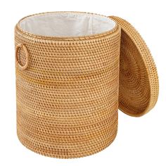 a round woven basket with white linings on the bottom and lid is shown against a white background