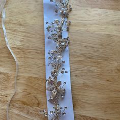 Champagne Floral Crystal Wedding Sash/Belt Flowers, Pearls, Crystals, And Leaves Adorn This Beautiful Sash, With White Sturdy Ribbon To Tie Around Your Midsection. Never Worn White Adjustable Wedding Sashes, Adjustable Ribbon Wedding Sashes, Adjustable White Bridal Belt For Bridesmaid, Wedding Sash Belt, Wedding Sash, Sash Belts, Sash Belt, Crystal Wedding, Davids Bridal