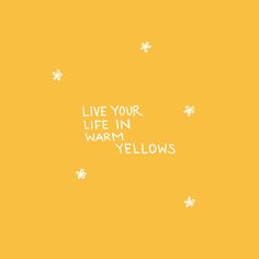 the words live your life in warm yellows on a yellow background with white stars