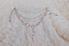 This gorgeous choker and earring set, features a 12" silver plated chain choker (with a 5cm extender chain), decorated with a layer of iridescent hearts and faux pearl beads: and a matching pair of dangle earrings, made with a silver plated ear hook. All items are packaged in a sanitized area and are carefully wrapped in tissue paper and shipped in a secure bubble lined envelope, all orders come with some adorable stickers and mini sweets as a free thankyou gift! All orders will be shipped withi Handmade Fairy Kei Silver Jewelry, Handmade Silver Fairy Kei Jewelry, Fairy Grunge Silver Dangle Jewelry, Silver Fairy Grunge Dangle Jewelry, Fairy Kei Silver Jewelry Gift, Silver Fairy Kei Jewelry For Gifts, Silver Fairy Kei Jewelry Gift, Handmade Fairy Grunge Necklaces For Party, Silver Fairy Grunge Necklaces For Festivals