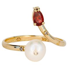 14k gold ring with pearl, garnet and diamonds. Pear garnet ring. Garnet and pearl open ended ring. 14k solid gold Weight: 2.2 g. depends from size Main stone - cultured Pearl White color, round cut, 6.2 mm size. Diamonds: 0.03 ct (3 x 0.01 ct), round brilliant cut, G/VS. Garnet: purplish red color, pear cut, transparent, 0.60 ct. Gold Ring With Pearl, Pearl White Color, Garnet And Pearl, Ring With Pearl, Diamond Bracelet Design, Gold Pearl Ring, Pearl And Diamond Ring, Garnet Ring, Open Ended