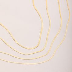 Redefine your daily accessories with our 14K REAL Gold Snake Chain Necklace--a timeless and unisex gold chain designed for everyday wear. This shiny serpentine chain offers a classic yet trendy look, making it the perfect gift for women and men or a thoughtful anniversary surprise.  Don't miss the chance to add sparkle to your style with this genuine gold chain. Make your statement--secure your layering chain necklace today. 📃 ITEM DETAILS * Material: Real solid Gold (no gold-filled or gold-plated) * Gold Karat: 14K (%58.5 gold purity) * Gold Color: Yellow * Chain Thickness: 1.50 mm, 1.80 mm, 2.00 mm, and 2.40 mm * Closure Style: Spring ring closure for 1.50 mm / Lobster clasp for 1.80 mm, 2.00 mm, and 2.40 mm 🎁 P A C K A G I N G * All of our products are sent with an elegant and stylish Gold Curb Chain Necklace In Fine Jewelry Style, Gold Plated Box Chain Necklace, Yellow Gold Snake Chain Necklace For Jewelry Making, 14k Gold Chain Necklace For Jewelry Making, Yellow Gold Curb Chain Necklace For Jewelry Making, Daily Accessories, Anniversary Surprise, Gold Snake Chain, Gold Chain Design