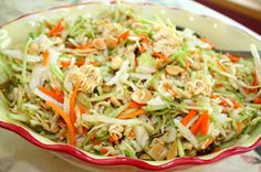 a bowl filled with coleslaw and carrots