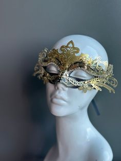 The set includes a striking gold and black mask for him and a captivating gold and black mask for her. The women's mask features a dramatic black feather, adding a touch of allure and mystique to her look. Whether you're attending a grand masquerade ball or a themed gala, this mask set ensures you'll be the center of attention.


Age Group/Gender - Adult/Unisex

Size/Type - One size fits all adults

Mask Color - Gold/Black

Mask Material - Polyresin

Special Features - Black feathers on the wome Gold Costume Masks For Halloween, Black Full Face Masquerade Accessories, Black Full Face Masquerade Costume Accessories, Gold Mardi Gras Mask Costume Accessories, Adjustable Masquerade Mask For Costume Party, Adjustable Masquerade Mask Costume Accessories, Gold Venetian Mask For Halloween, Gold Venetian Masquerade Mask For Halloween, Venetian Gold Masquerade Mask For Halloween