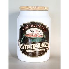 a white canister with an image of witches brew on it