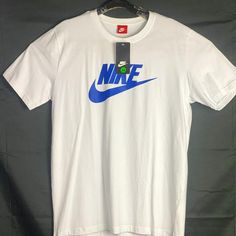 Nwt 100% Cotton Ask Any Questions Nike Cotton Crew Neck Shirt, White Cotton Shirt With Logo Print, Nike White Cotton Shirt, Nike Cotton Top, Nike White T-shirt With Letter Print, Nike Cotton Tops With Branding, Blue Graphic Tee With Branding, Casual White Shirt With Logo Print, Casual Shirt With White Logo Print