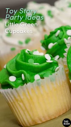 cupcakes with green frosting and white sprinkles