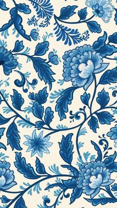 a blue and white floral wallpaper with flowers on the left side, and leaves on the right