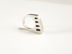 Everyone should have at least one silver statement ring in their jewelry collection. This architectural ring is hand fabricated with sterling silver and has a lovely minimalist style. Great for everyday and gift giving. Materials: sterling silver Finish: It has a satin finish Band width: approximately 3/8 inches Available sizes: US 6-14 Fabrication 1-2 weeks fabrication time Shipping: Free shipping within the US Looking for other statement rings? you can find them here https://www.etsy.com/shop/ Modern Handmade Sterling Silver Rings, Modern Sterling Silver Rings With Unique Design, Modern Sterling Silver Ring With Unique Design, Modern Hand Cast White Gold Ring, Contemporary Sterling Silver Rings For Gifts, Contemporary Sterling Silver Rings As Gift, Contemporary Rings With Unique Design For Gift, Modern Silver Rings, Contemporary Silver Ring With Unique Design