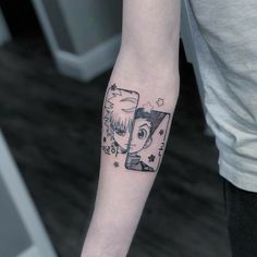 a person with a tattoo on their arm